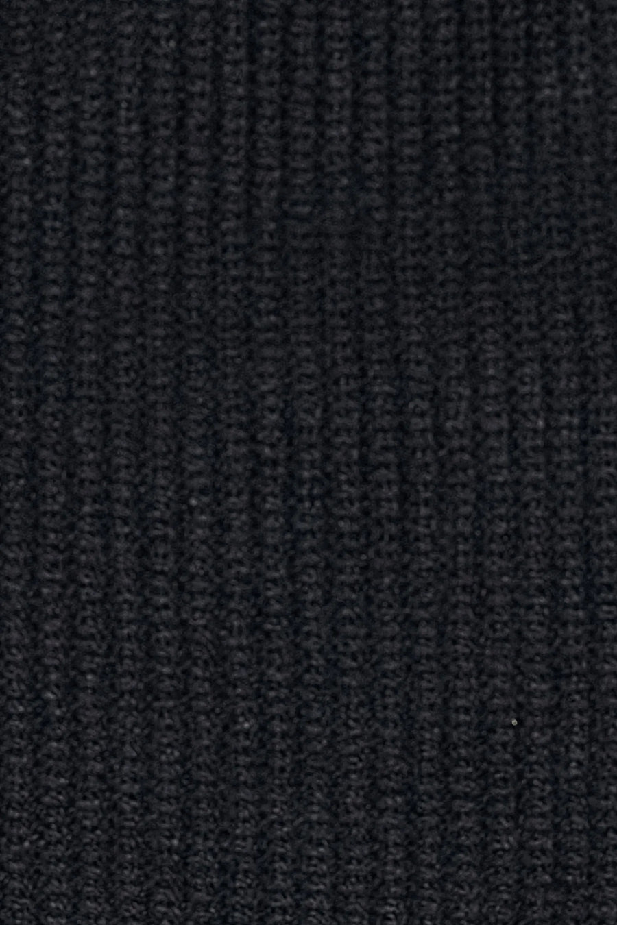 Black Unisex Knit Skully Beanie features a TLF clip label and uses a premium viscose knit fabric blend for premium comfort by TLF Apparel – fabric view 
