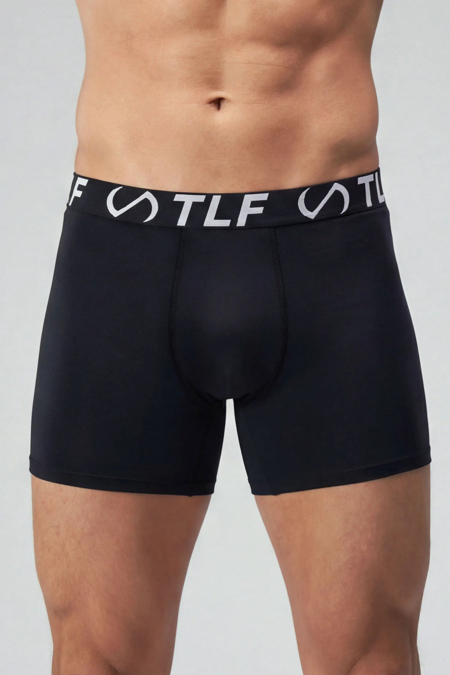 Black Mens Performance Boxer Brief with stretch training fabric and ergonomic athletic fit by TLF Apparel – side view 
