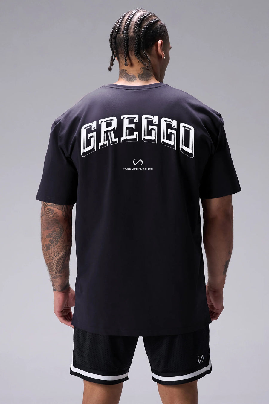 Black TLF x Matt Greggo Cotton Luxe Oversized Tee showing Take Life Further back graphic and oversized fit by TLF Apparel – back view