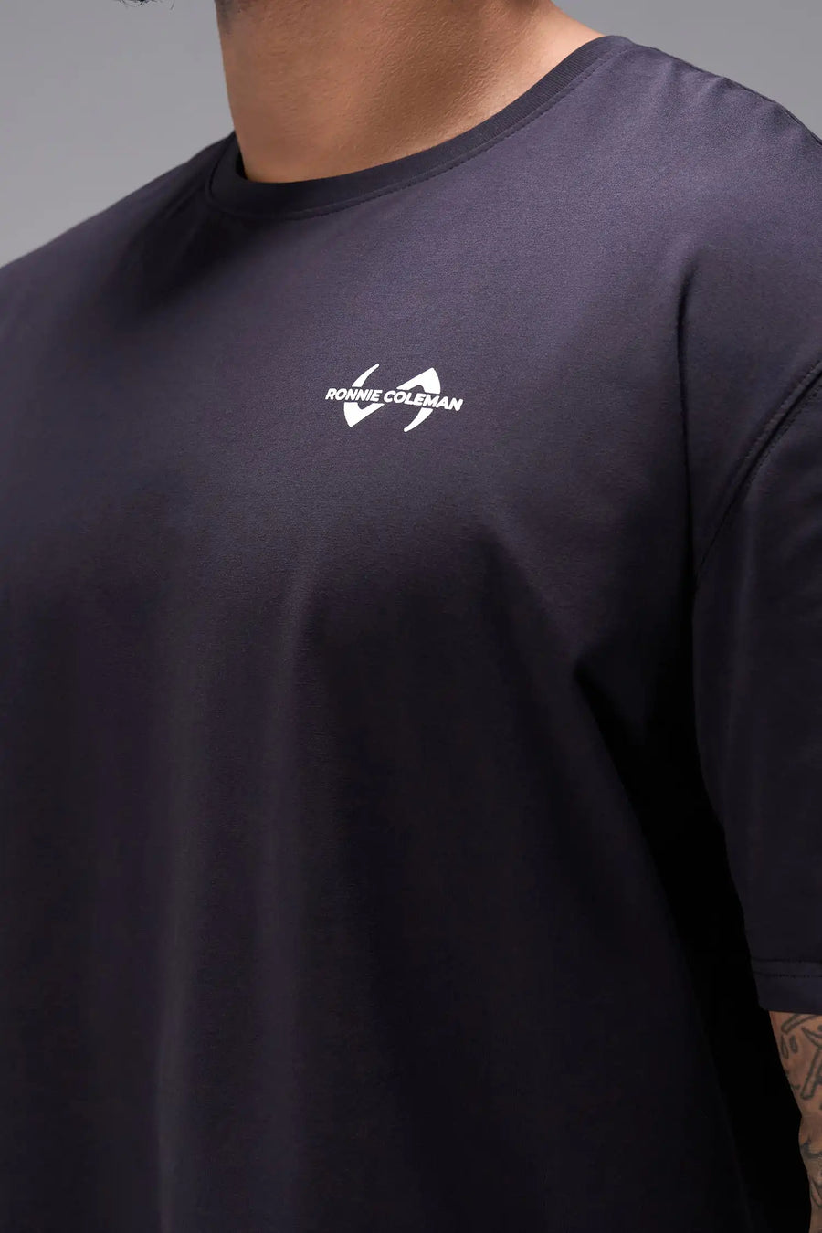 Black Ronnie Coleman “Yeah Buddy” Tee showing Ronnie Coleman x TLF chest logo and ultra-soft Cotton Luxe DNA™ fabric by TLF Apparel – front detail view