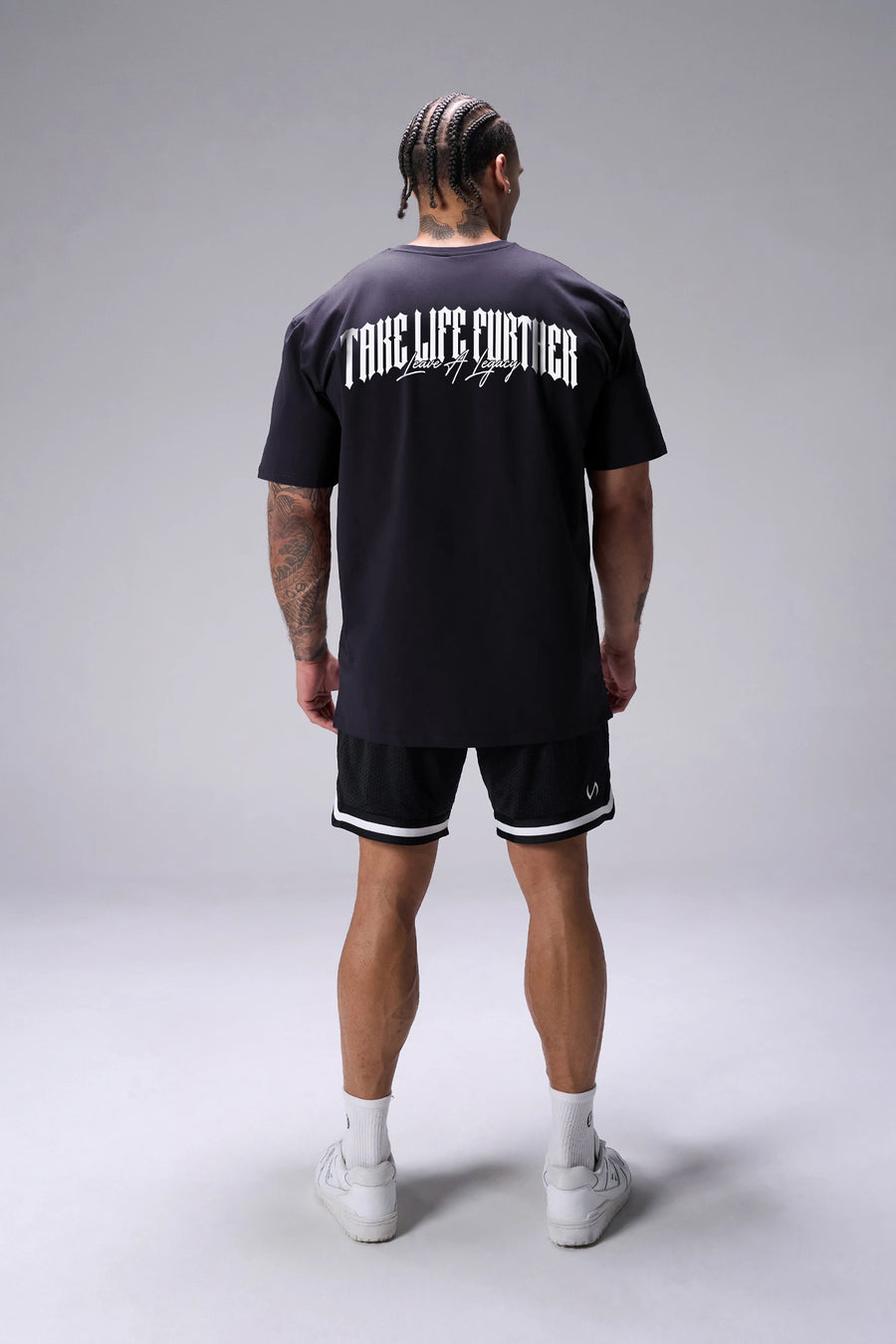 Black Sinister Cotton Luxe Oversized Tee with statement Take Life Further upper back graphic by TLF Apparel – back view 