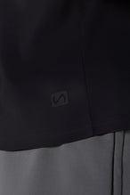 Black GTS Everyday Cotton Crew Neck Shirt showing sculpted silicone icon patch and cotton blend by TLF Apparel – detail view
