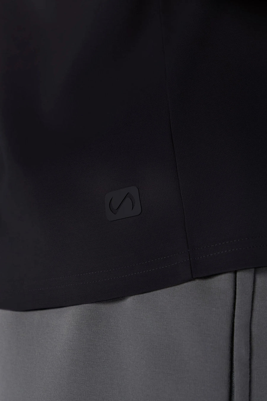 Black GTS Everyday Cotton Crew Neck Shirt showing sculpted silicone icon patch and cotton blend by TLF Apparel – detail view