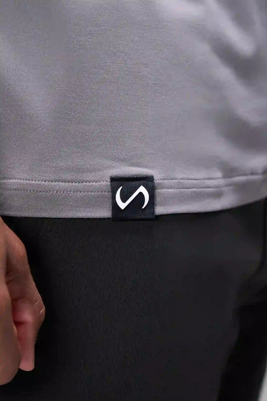 Gray Bamboo V Neck Essential Tee showing ultra soft bamboo fabric texture and silicone icon label detail by TLF Apparel – detail view