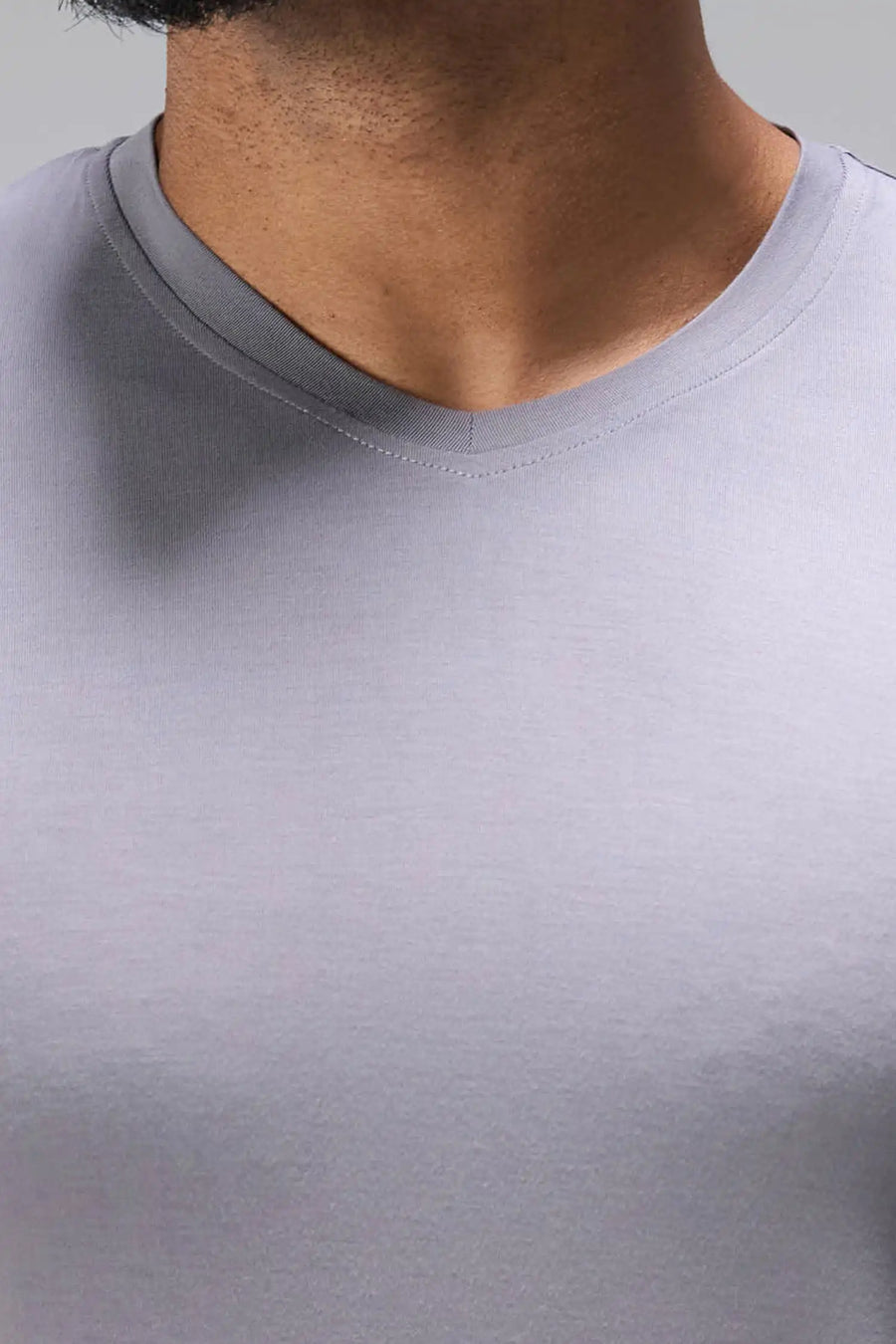 Gray Bamboo V Neck Essential Tee showing ultra soft bamboo fabric texture and silicone icon label detail by TLF Apparel – detail view