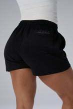Black GTS French Terry Sweat Shorts showing rear back pocket with Take Life Further embroidery by TLF Apparel – back view