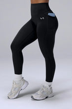 Black Tempo Leggings With Pockets in Luxe DNA™ fabric with high waisted sculpting waistband by TLF Apparel – front view