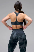 Back View of Lunar Forest TLF Cosmic Seamless Scrunch Butt Leggings, featuring a scrunch butt to shape and contour your glutes 