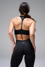 Back View of Black Tie Dye TLF Cosmic Seamless Sports Bra features adjustable strap for custom fit with high support for performance and functionality