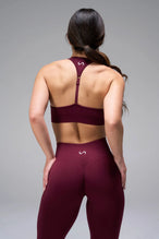 Back View of Dark Cherry TLF Cosmic Seamless Sports Bra features adjustable strap for custom fit with high support for performance and functionality