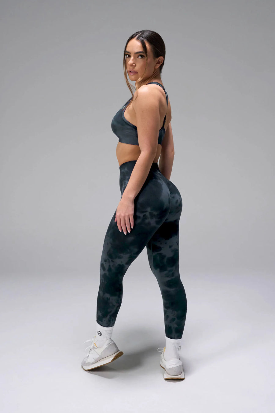 Side View of Green Tie Dye TLF Cosmic Seamless Sports Bra features adjustable strap for custom fit with high support for performance and functionality