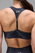Side View of Blue Tie Dye TLF Cosmic Seamless Sports Bra features adjustable strap for custom fit with high support for performance and functionality