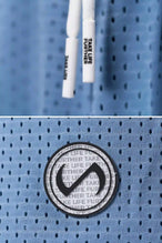 Light Blue Reps Mesh 5 Inch Shorts showing Mesh Tech DNA™ fabric, side split hem construction, and premium details by TLF Apparel – detail view