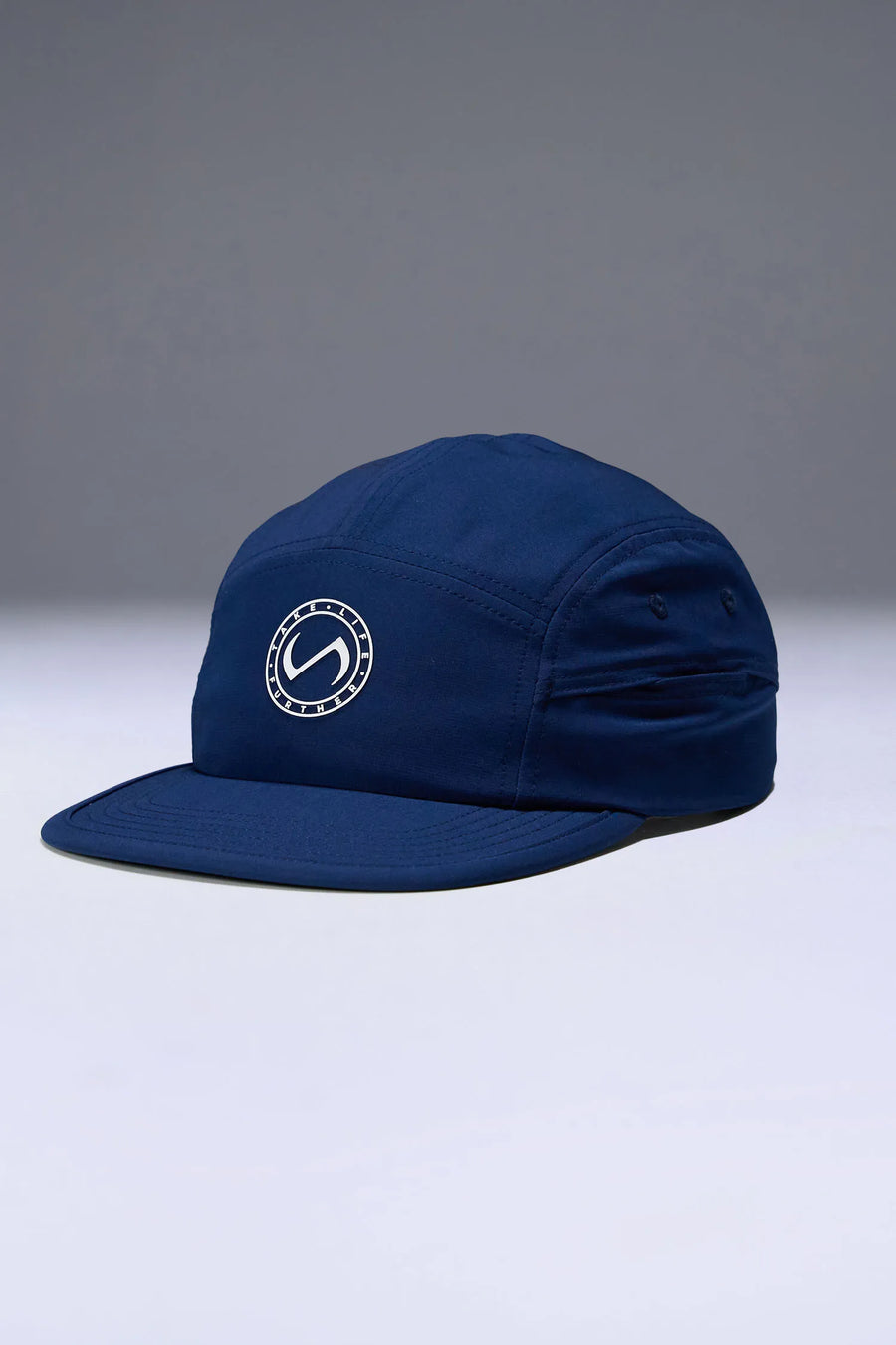 Blue Pluma Packable Hat with ultra-light ripstop fabric and extended performance brim for training and outdoor workouts by TLF Apparel – front view 