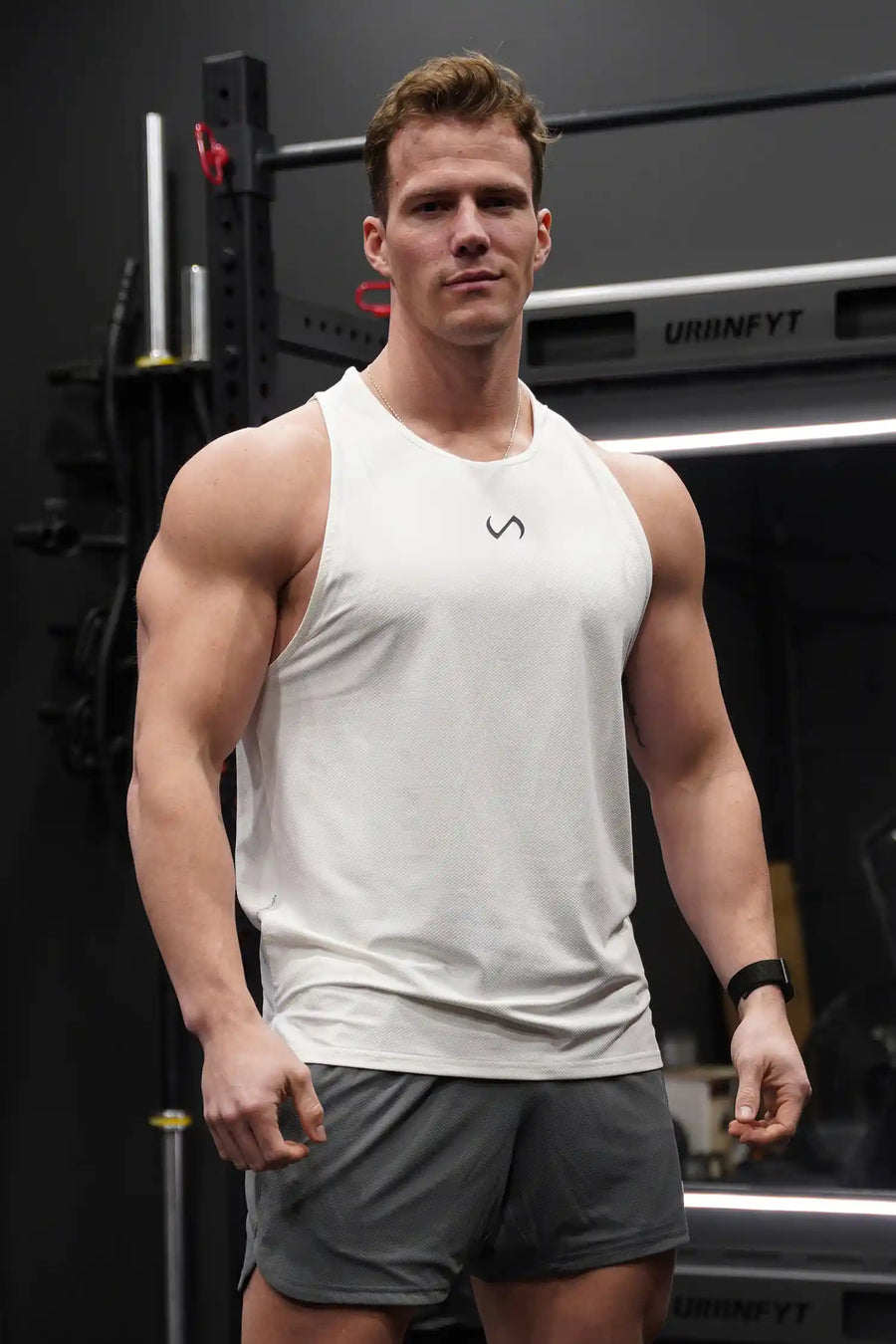 White Men’s Micro Mesh Tank with a physique-enhancing fit, designed for gym training, HIIT workouts and running by TLF Apparel – back view 