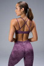 Detail Front View of Purple TLF Cosmic Seamless Strappy Sports, featuring medium impact support and a strappy back design 