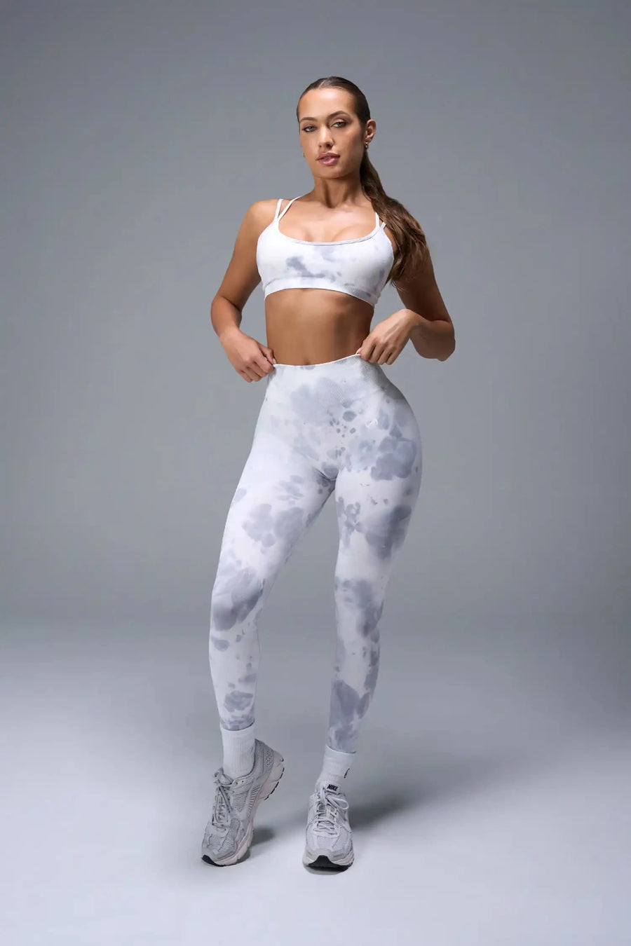 Front View of White TLF Cosmic Seamless Strappy Sports, featuring medium impact support and a strappy back design 
