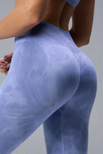 Back View of Blue TLF Cosmic Seamless Scrunch Butt Leggings, featuring a scrunch butt to shape and contour your glutes 