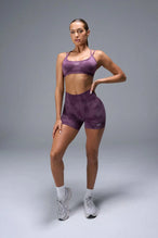 Front View of Purple TLF Cosmic Seamless Scrunch Butt Shorts, featuring a scrunch butt to shape and contour your glutes 