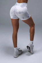 Back View of White TLF Cosmic Seamless Scrunch Butt Shorts, featuring a scrunch butt to shape and contour your glutes 