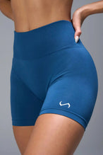Front View of Blue TLF Cosmic Seamless Scrunch Butt Shorts, featuring a scrunch butt to shape and contour your glutes 