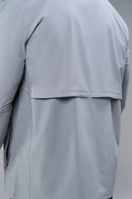 Back View of Gray TLF Element Athletic Jacket, featuring multiple zipper pockets, and ripstop panels for breathability and stretch 