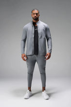 Front View of Gray the TLF Element Infi-Dry Hybrid Joggers featuring side zipper pockets, zippered ankles and drawcord waistband for a custom fit. 