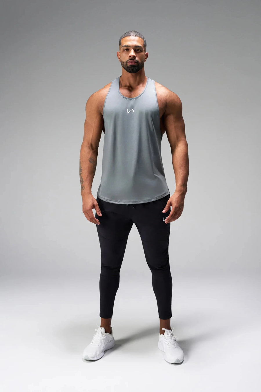 Front View of Black the TLF Element Infi-Dry Hybrid Joggers featuring side zipper pockets, zippered ankles and drawcord waistband for a custom fit. 