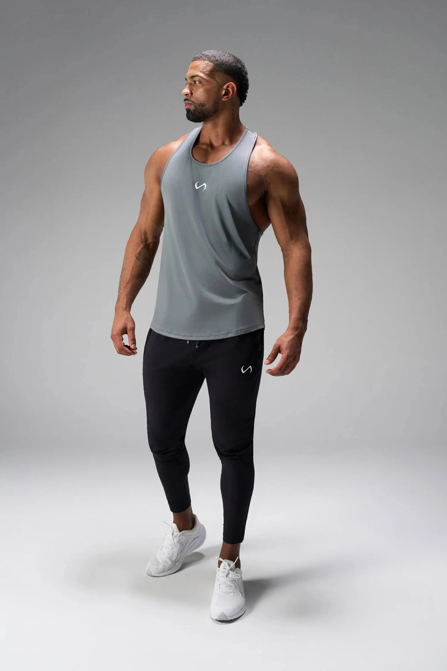 Front View of Black the TLF Element Infi-Dry Hybrid Joggers featuring side zipper pockets, zippered ankles and drawcord waistband for a custom fit. 