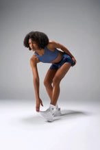 Front View of the Blue the TLF Element Infi Dry Shorts With Liner featuring built in shorts with pockets and high side slit for mobility