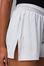 Front View of the Gray the TLF Element Infi Dry Shorts With Liner featuring built in shorts with pockets and high side slit for mobility