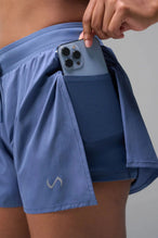 Front View of the Blue the TLF Element Infi Dry Shorts With Liner featuring built in shorts with pockets and high side slit for mobility
