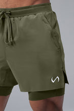Green TLF Element Shorts With Liner — product video showing the 2-in-1 design, liner short and side zipper pockets