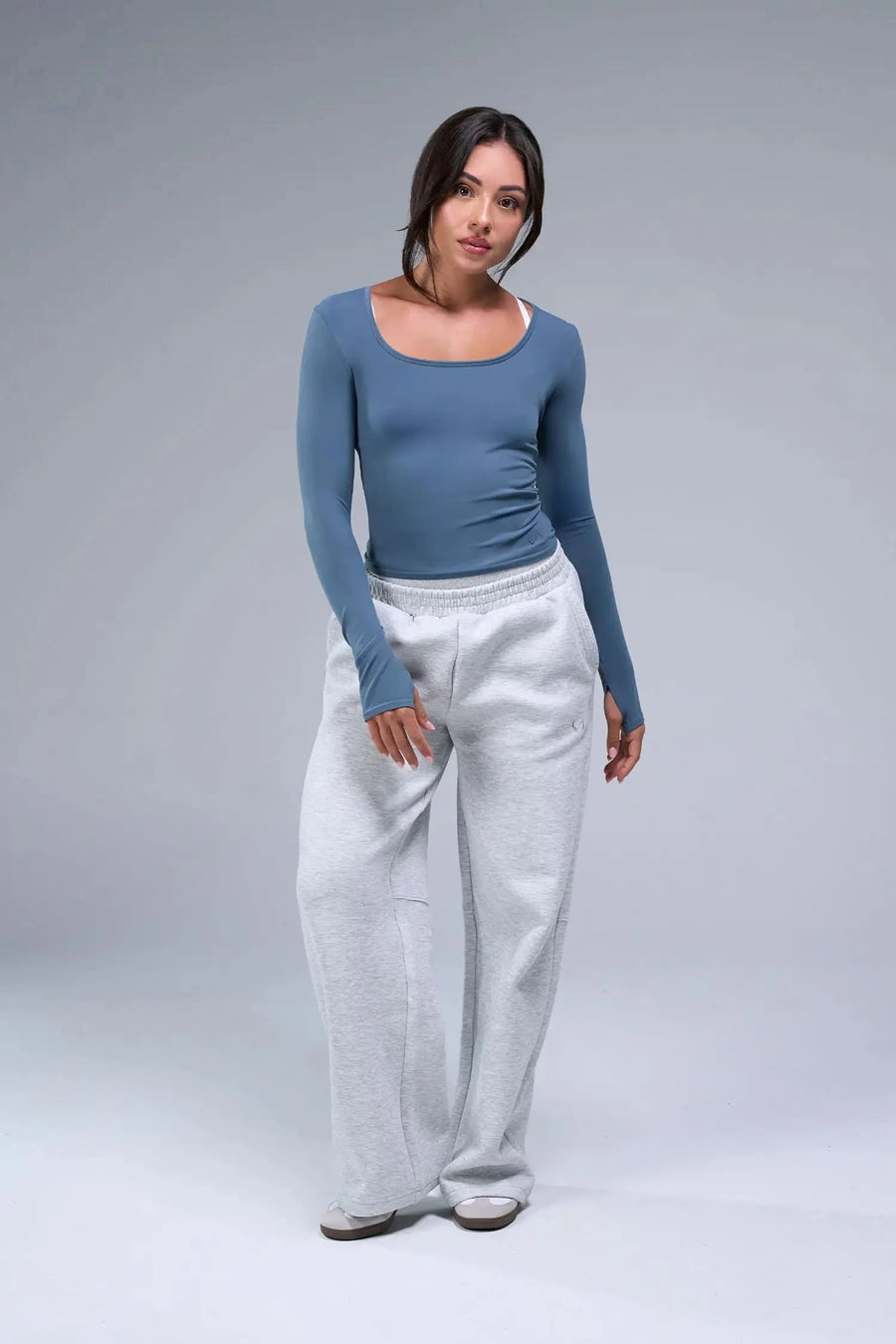 Front View of Blue TLF Essential Seamless Reversible Scoop Neck, featuring thumbholes and multi wear for boat neck or scoop neck styling 