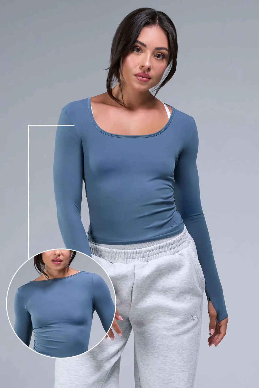 Front View of Blue TLF Essential Seamless Reversible Scoop Neck, featuring thumbholes and multi wear for boat neck or scoop neck styling 