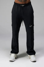 Detail View of Black the TLF GTS Element-Max Cargo Pants featuring front cargo pockets and an adjustable ankle drawcord ankle for custom fit