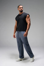 Front View of Blue the TLF GTS Element-Max Cargo Pants featuring front cargo pockets and an adjustable ankle drawcord ankle for custom fit