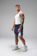 Side View of Blue the TLF GTS Element-Max Shorts featuring contrast color panels and sleek invisible side zipper pockets