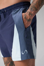 Detail Front View of Blue the TLF GTS Element-Max Shorts featuring contrast color panels and sleek invisible side zipper pockets