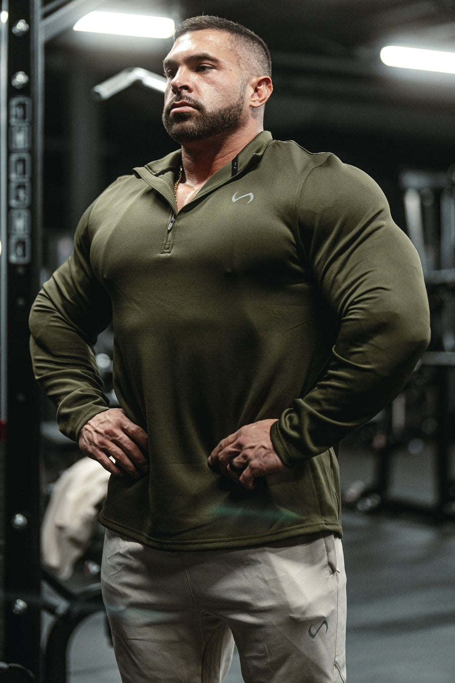 Front View of Marshland TLF GTS Quad Tech Quarter-Zip Pullover redefining modern activewear, this men’s 1/4 zip pullover blends technology with sleek style 