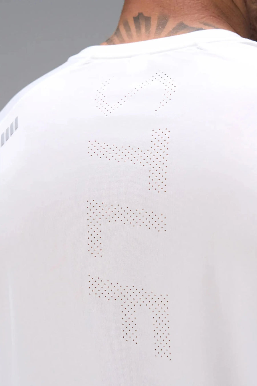 White TLF Infi Cool Lightweight Cooling Shirt — product video showing the cooling fabric, raglan sleeves and laser-cut perforations