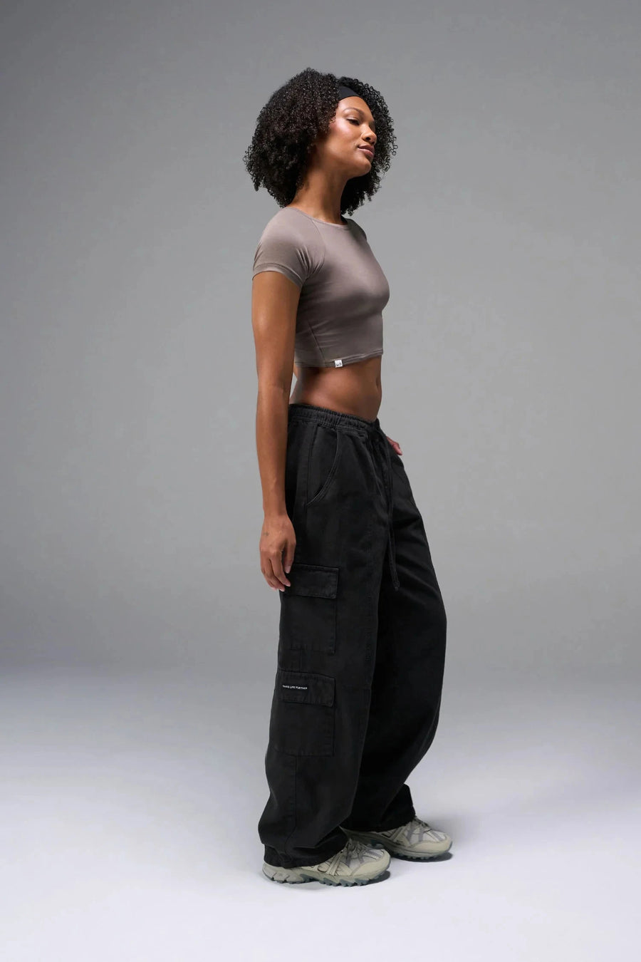 Black TLF Low Rise Oversized Cargo Joggers — product video showing the low-rise waist, baggy fit and snap button cargo pockets