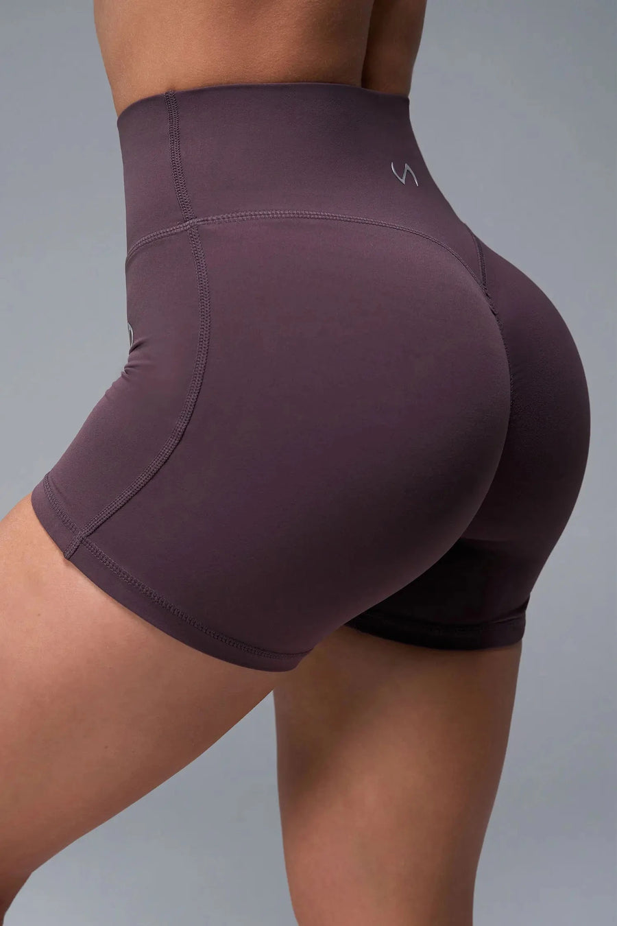 Front View of Brown TLF NeoCloud™ 4 Inch Secret Glute Seam Shorts featuring our new secret glute seam technology to lift and shape your glutes.