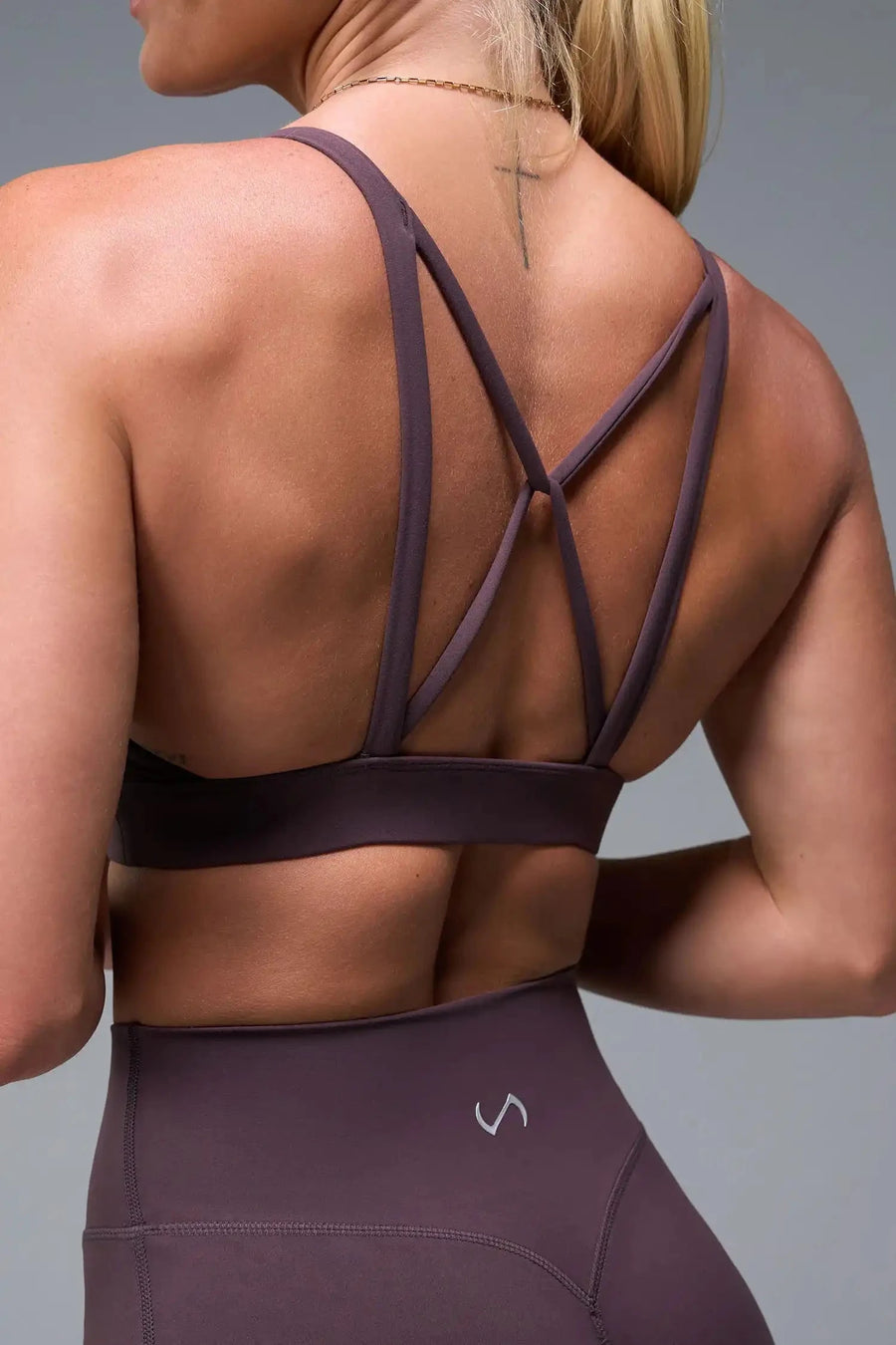 Back View of Black TLF NeoCloud™ Keyhole Sports Bra featuring a strappy back and keyhole front design with low to medium support