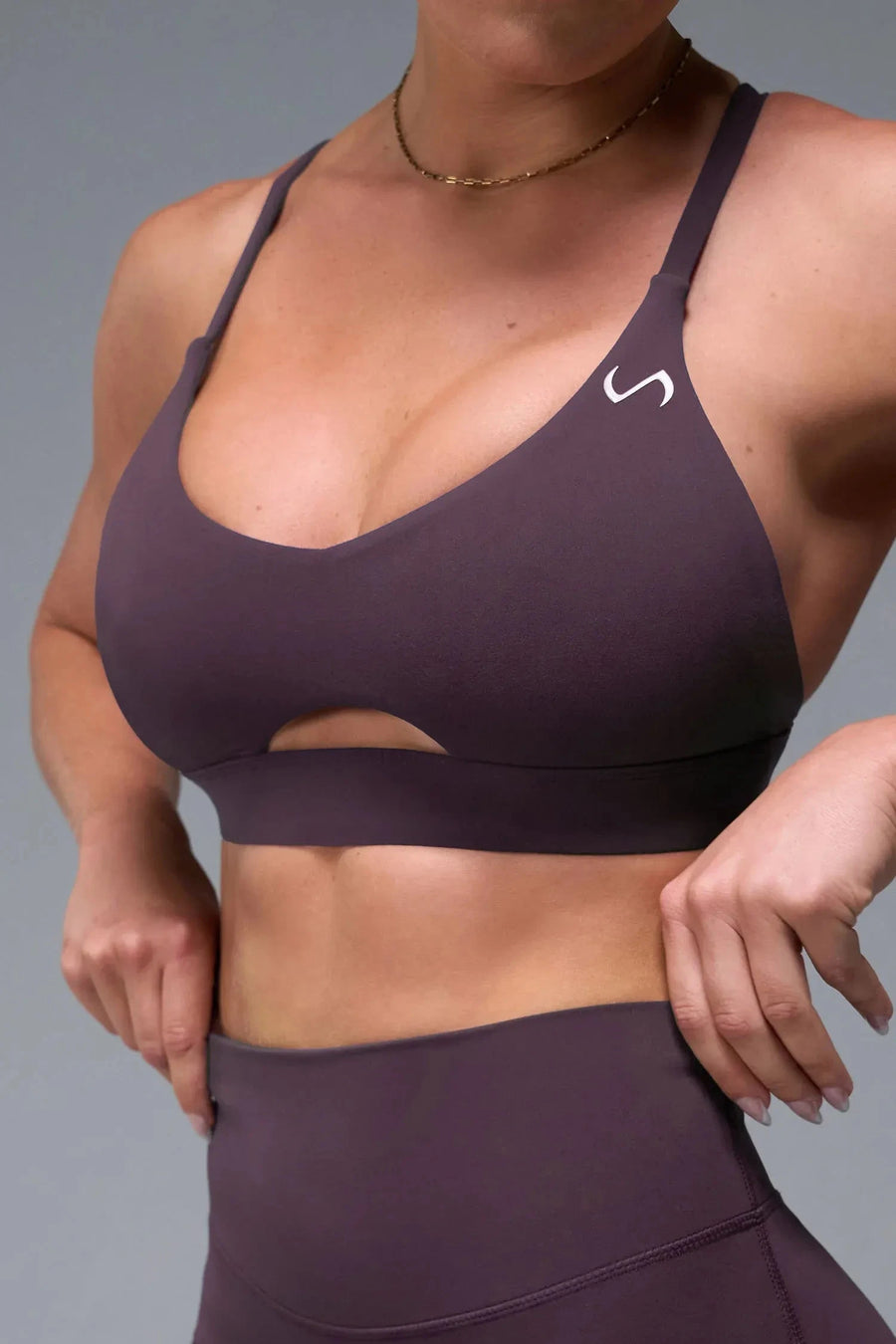 Front View of Black TLF NeoCloud™ Keyhole Sports Bra featuring a strappy back and keyhole front design with low to medium support