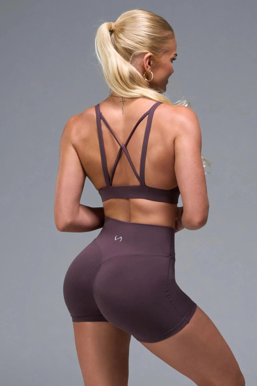 Back View of Black TLF NeoCloud™ Keyhole Sports Bra featuring a strappy back and keyhole front design with low to medium support