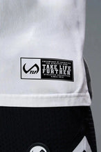 Front View of White TLF Property of Cotton Luxe Oversized Tee featuring a distressed graphic print design across the chest in our oversized t shirt fit