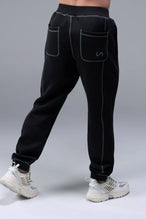 Black TLF Scuba Tech Contrast Stitch Joggers — product video showing the side zipper pockets, contrast stitching and tapered fit