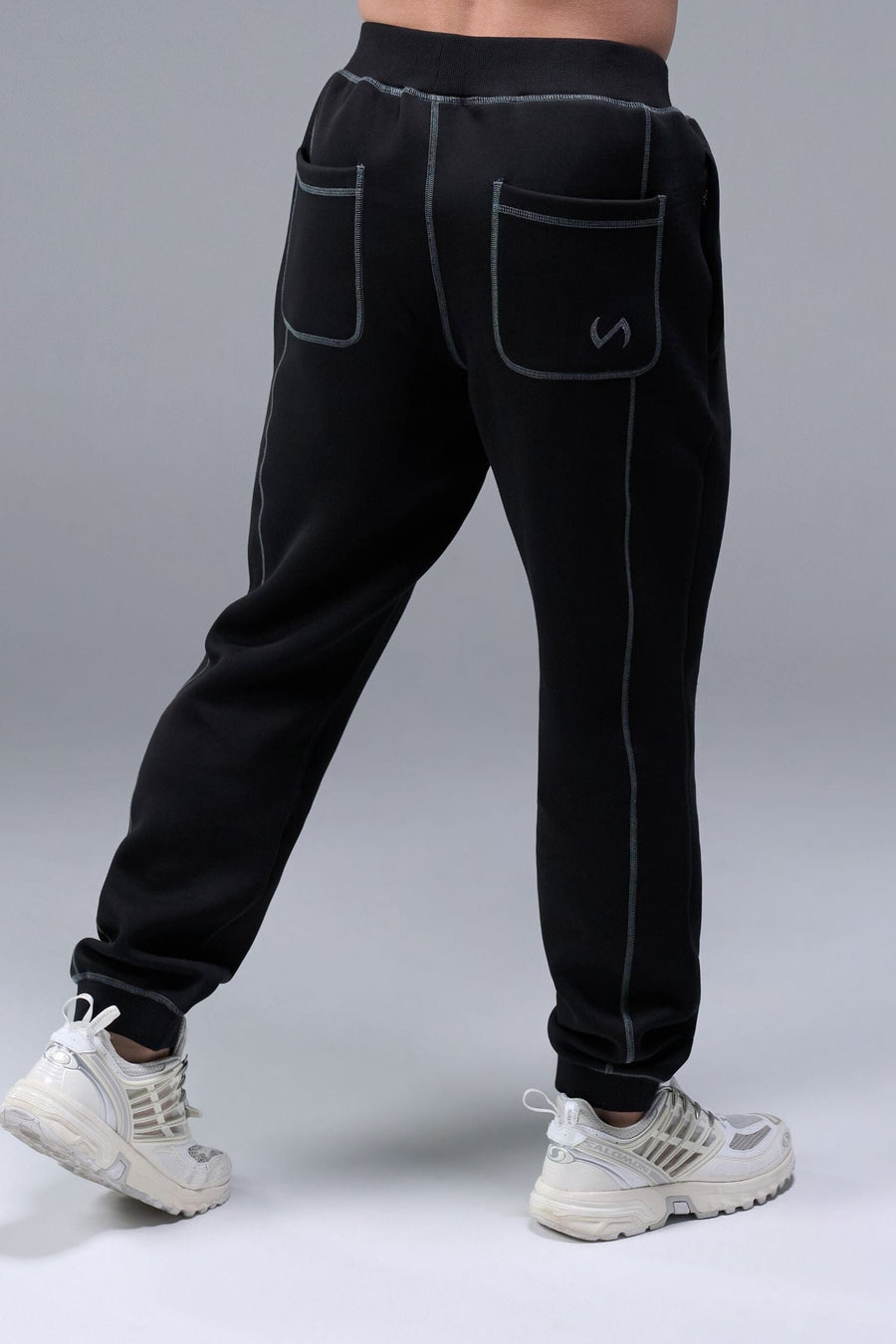 Black TLF Scuba Tech Contrast Stitch Joggers — product video showing the side zipper pockets, contrast stitching and tapered fit