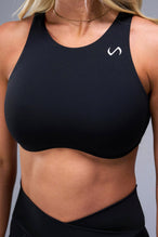 Detail Front View of Black TLF Tempo High Neck Sports Bra, featuring a high neckline for high impact support during workouts, cardio and all day wear 